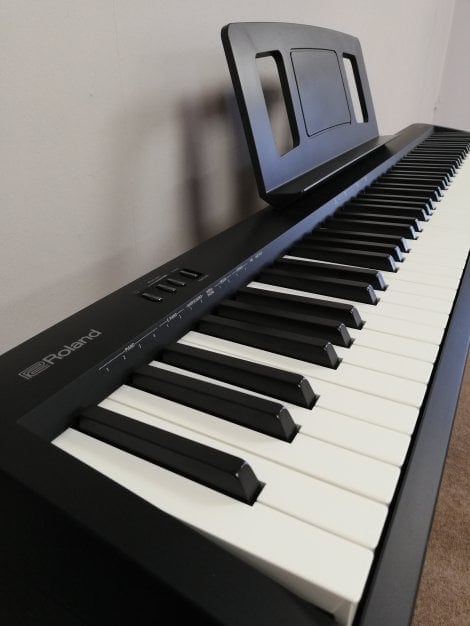 The FP10's keys are made of plastic but coated with a material that mimics the texture of ivory